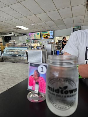 Cute table numbers of plant-based celebrities. at Midtown Vegan Deli & Market in Tucson
