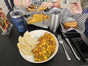 Midtown scramble, sloppy joe (Monday special) animal style fries, tater tots, and the Philly (steak). at Midtown Vegan Deli & Market in Tucson