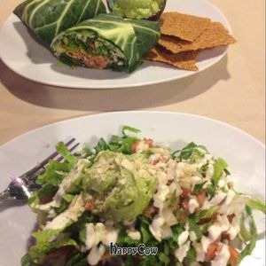 raw collard burrito & raw enchiladas  at AmeRAWcan Bistro in Tacoma
