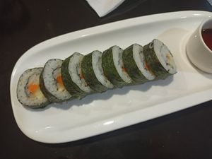 Veggie kimbap (already ate some 😋) at Seoul in Sevilla