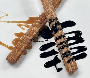 Churros w chocolate or dulce de leche. 
Seasonal syrups: hibiscus, lavender, honey bacon at Salsa Street Grill in Madison