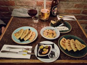 Greek olives, pita bread and fava. Wine was vegan too! at Restaurang Mediterranean in Lund