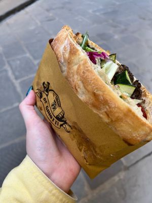 Labelled as Francesa Vegana on the menu, with courgette/zucchini, salad, sun dried tomatoes and truffle crème onion toasted focaccia, very tasty and fresh!  at I' Girone De' Ghiotti in Florence