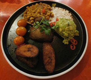 Big Vegan Grill Down: Roasted mushrooms, tomatoes, smashed avo, curried chickpeas, sweet plantain and grilled roti at Turtle Bay in Manchester