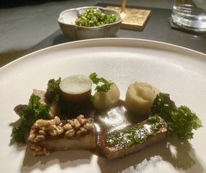 Main course of celeriac, horseradish and kalettes with kale salad  at Glacier Fine Dining in Grindelwald