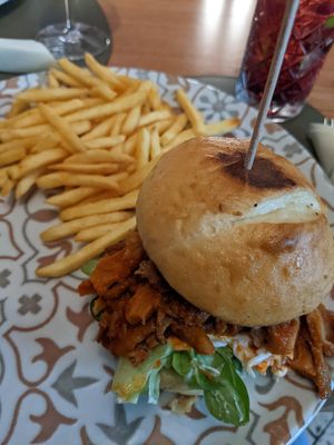 Vegan burger with bbq oyster mushrooms and fries 🤤 at Barakokula in Split