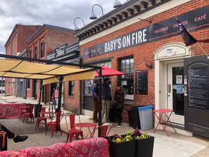 Nice outdoor eating area at Baby's On Fire in Baltimore