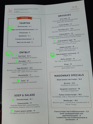 current food menu (8/25): "x" for veganizable, "(v)" for vegan at MADONNA in Amersfoort