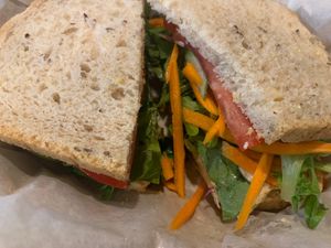 Veggie #2 hummus, carrots, cucumbers, tomatoes, mixed greens, olive oil and vinegar.   at Mountain Deli in Hendersonville