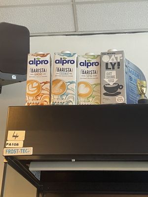 Selection of plant milks   at Wax and Beans in Bury