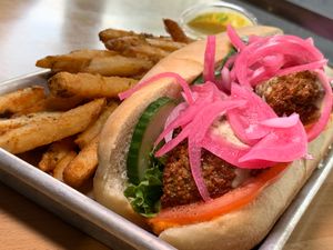 Falafel Hero: Falafel, Pickled Red Onions, Cucumbers, Tomatoes, Greens, Tzatziki, Hummus on a Hoagie Bun w/ Fries (Grand Rapids Vegan Chef Challenge 9/25) at Broad Leaf Brewery & Spirits in Kentwood