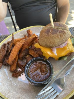 Buffalo Chicken Sandwich with sweet potato fries (pickles, onions and cheese )  at The Volstead by Unity in Philadelphia