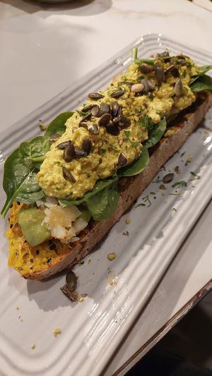 Sourdough with vegan "scrambled eggs" at Busy Bee Cafe in Sliema