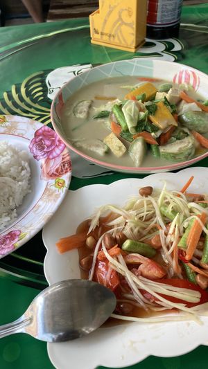Green curry and papaya salad  at Jeng Noodle Thai Food & Vegetarian Food  in Bangkok
