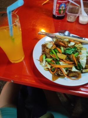 Orange juice and pad see Ew at Jeng Noodle Thai Food & Vegetarian Food  in Bangkok