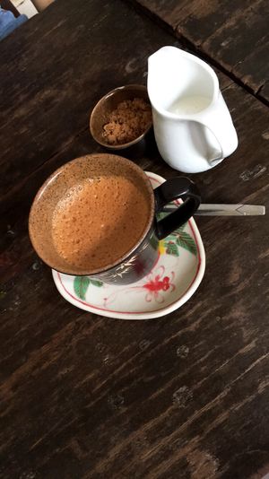 Hot black vietnamese coffee with coconut milk  at The Hanoi Social Club in Hanoi