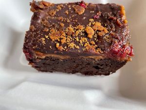 Biscoff, raspberry and chocolate brownie  at Grain and Grind in Inverness