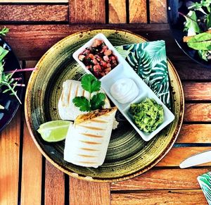 The lunch time Burrito is packed with flavour and smacks of Mexico. Vegan sour cream, guacamole and pico de gallo make refreshing sides. at Cafe@62 in Brighton