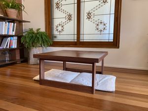 restaurant has two lower and two higher tables  at Santosha 산토샤 in Jeju