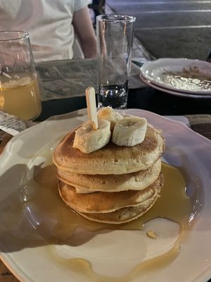 Vegan Pancakes (4) with caramel syrup and bananas  at Aparto Bistro & Cafe in Kavala