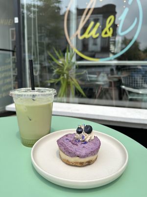 Raw blueberry tart and matcha latte with oat milk. They have almond and soy milk options, too.  at lu & i in Montreal