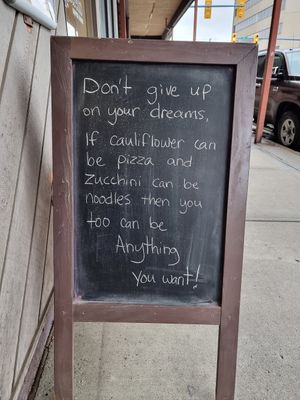 Message in front of the café :) at Ristretto Coffee House in Prince George