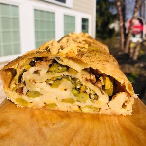 Savory traditional strudel from scratch, cauliflower- asparagus with vegan cheddar cheese   at Jules' Kitchen in Ipswich
