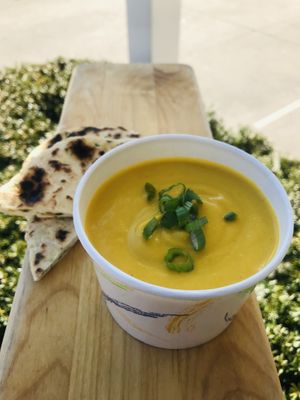 Sweet potato bisque with coconut milk and Thai chili and homemade naan bread   at Jules' Kitchen in Ipswich