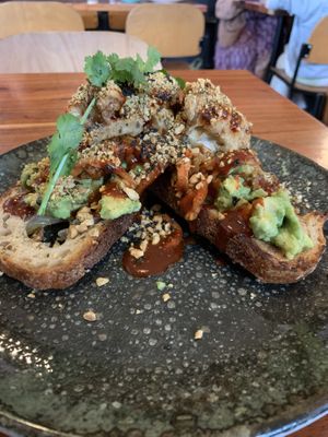 Vegan smashed avocado on toast interesting but kimchi was a bit overpowering    at Source Foods in Perth
