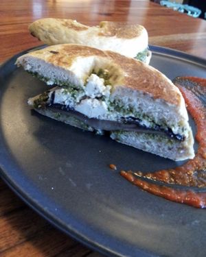Vegan bagel with mushrooms, pesto and tofu 'feta' at Source Foods in Perth