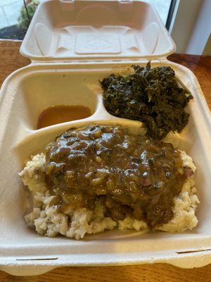 Vegan Fried steak with mushroom gravy served overtop coconut milk mashed potato’s, side of stewed kale. Excellence, will dream about  at Sir Vegaani in Roanoke