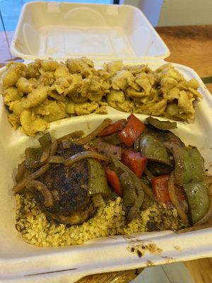 One of a kind House made vegan oxtails with onion bell pepper gravy. Double side of the best Mac and cheese.  at Sir Vegaani in Roanoke