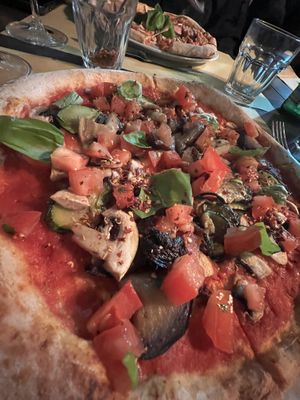 Closeup of the vegan pizzaa  at Spaccio Alimentare in Florence
