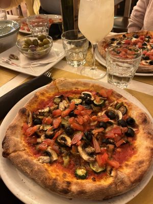 Vegan Pizza, Marinated Olives and Limoncello Spritz!  at Spaccio Alimentare in Florence