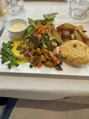 Potato and lentil patty with veggies   at Le Pommier in Bayeux