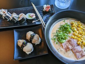 Spicy toona roll, scallop truffle nigiri, and tom kha ramen with vegan "vork belly" at House of Vegano in St Petersburg