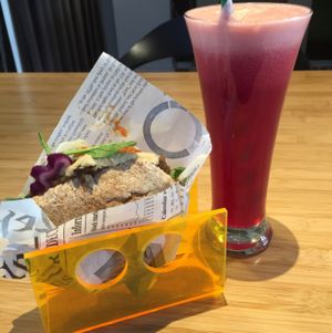 hummus sandwich and apple, pineapple, red cabbage juice at Botaniq in Copenhagen