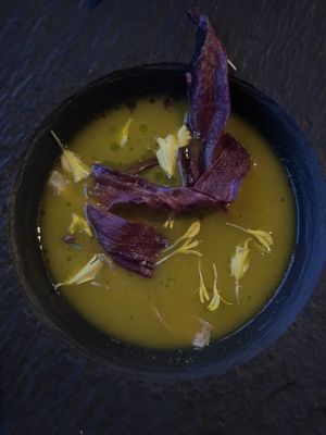 Pompoensoep met paarse bataat  at Nomad in Amsterdam