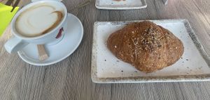 Cappuccino di soia e brioche vegana vuota  at Pasticceria Agostini in Padua