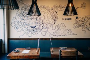 Incredible artwork glosses the walls. at Bonsai Plant Kitchen in Brighton