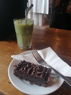 Iced oat milk latte and a double chocolate brownie at 200 Degrees Coffee in Sheffield