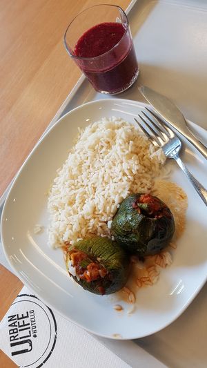 Lunch of the day (stuffed round zucchini with tomato sauce & leek) & strawberry + blueberry smoothie at Community Kitchen in Munich