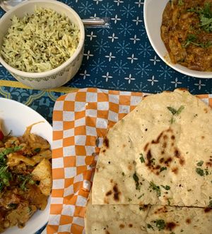 We ordered samosas (not pictured…large size) buttered garlic naan, aloo gobi, baigan bartha and rice. Big enough portions for two people to share.  at Red Indian Chilli in Oaxaca