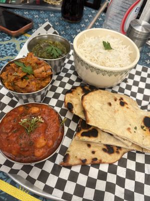 Vegan thali with baigan bharta, chaana masala, y saag aloo  at Red Indian Chilli in Oaxaca
