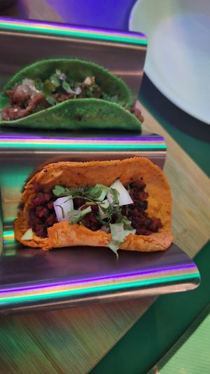🌮💚: Chicharrón; 🌮🤎: Pastor at El Taco Loco Vegano in San Andres Cholula