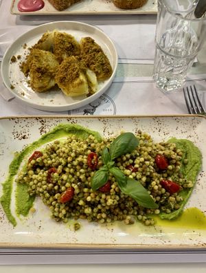 Roasted fennel and “Baia Sardinia”, which is Fregola pasta with basil pesto    at Elk Bakery - The Garden in Verona