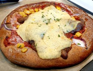 pizza bread.. has vegan bulgogi inside at Steel Yard in Seoul
