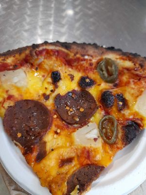 Vegan pepperoni. By my request, it is slightly burnt at Slice of Heaven in Dunedin