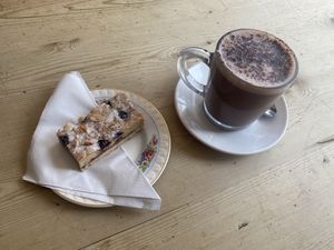 Blueberry Bakewell and oat hot chocolate  at Romilly's in Barry