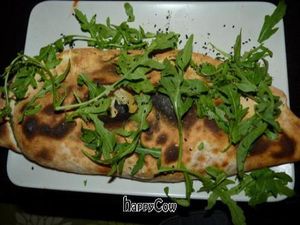 Pizza calzone Schnitzel at Sfizy Veg in Berlin